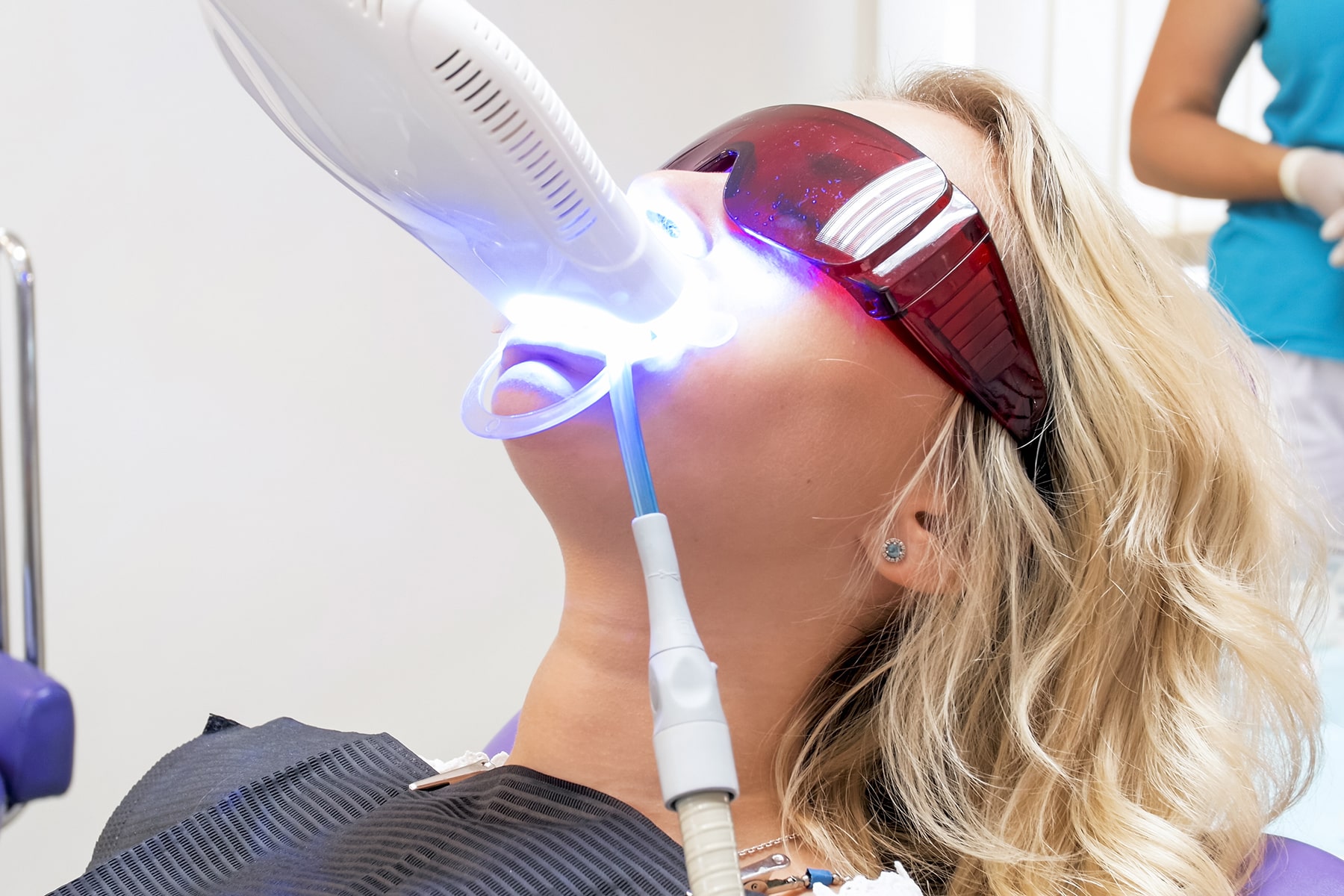 Woman getting her teeth whitened in New Albany, OH