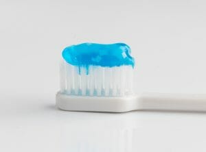 toothpaste on a toothbrush