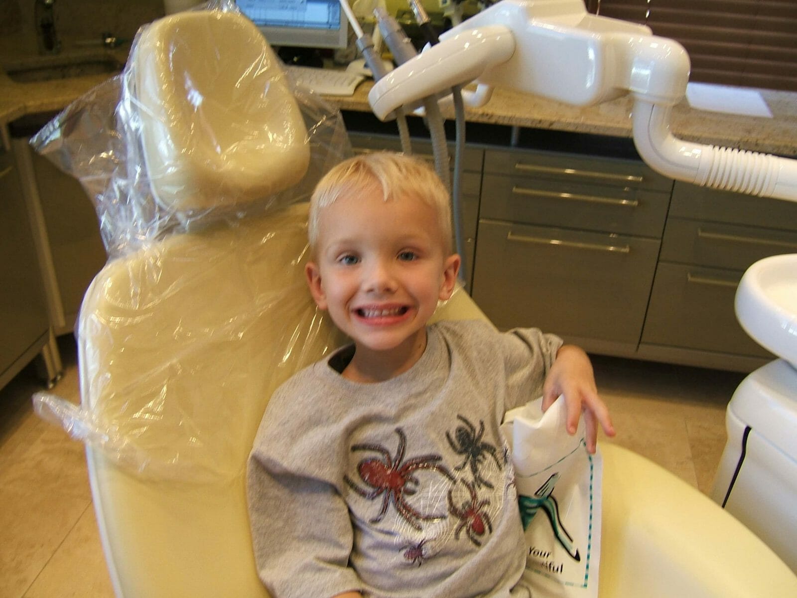 child in dentist chair