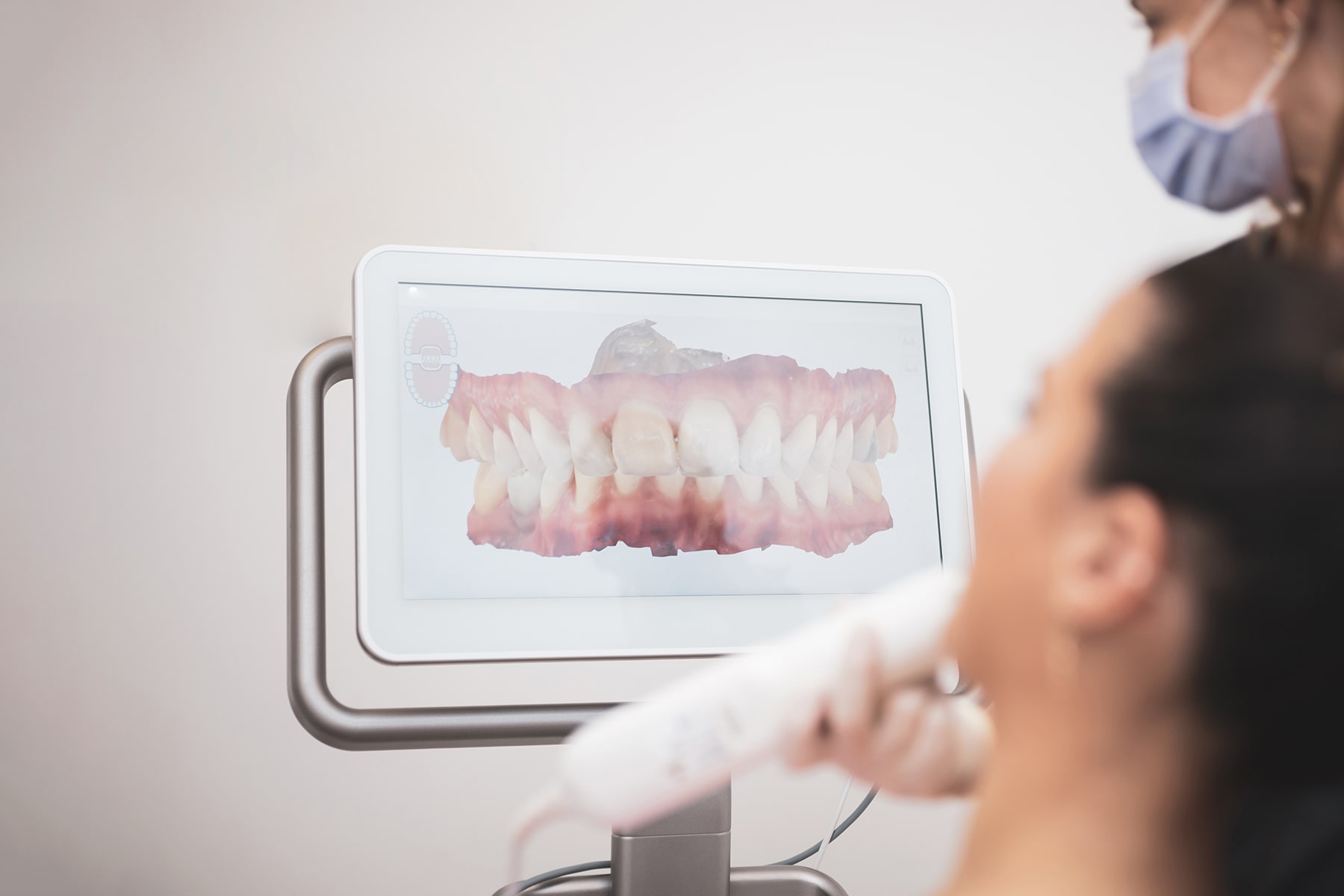 Woman getting an oral examination in New Albany, OH